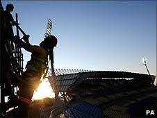 Construction workers at the Royal Bafokeng Stadium, Rustenberg