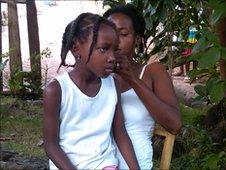 Telia Jacques, 6, with her mother Bruna, Anse-a-Veau, Haiti.