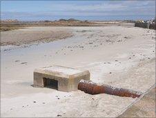 Water outfall on the beach at Cobo