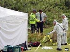 Police forensic officers at the scene of the stand-off with Raoul Moat in Rothbury