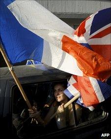 Kosovo Albanians celebrate in Pristina on July 22, 2010 as the ICJ renders its opinion on the legality of Kosovo"s indepedence.