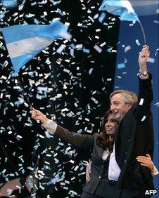 Cristina Fernandez de Kirchner and her husband at a 2008 rally