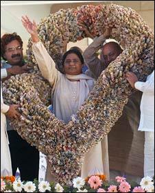 Ms Mayawati receiving the garland on 17 March in Lucknow