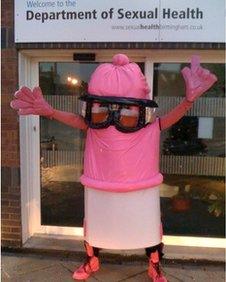 Person dressed in condom costume