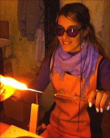 Irena at work in the glass-blowing workshop