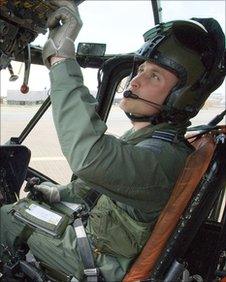 Prince William in the seat of a Sea King helicopter at RAF Valley, Anglesey