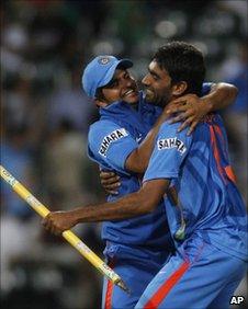 Munaf Patel (right) celebrates with fellow team member Suresh Raina after winning an ODI against South Africa