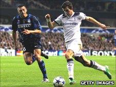 Gareth Bale of Spurs takes on Lucio of Inter Milan