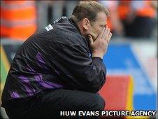 Ospreys forwards coach Jonathan Humphreys shows his dejection after losing to Munster