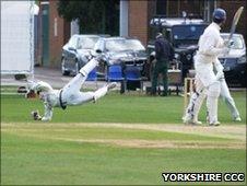 Barney Gibson makes his first of two catches