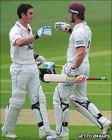 Somerset batsman Craig Kieswetter (l) is congratulated by Nick Compton