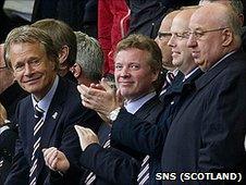 Rangers owner Craig Whyte and some club directors applaud the team's win against Kilmarnock