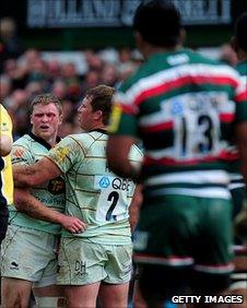 Chris Ashton reacts after being punched by Manu Tuilagi