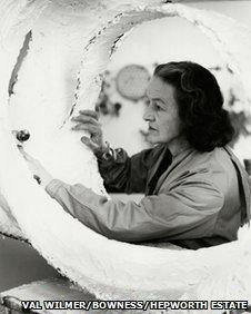 Barbara Hepworth at work on the plaster for Oval Form (Trezion) , 1963, Photograph: Val Wilmer, Bowness, Hepworth Estate