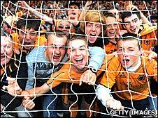 Wolves fans on the pitch