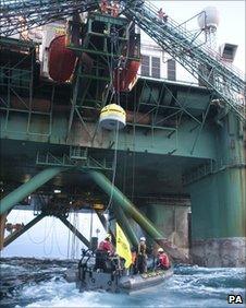 Greenpeace activists board the rig