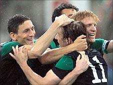 Republic players celebrate after Simon Cox made it 2-0 near the end against Italy