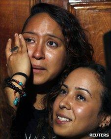 A lesbian couple celebrates at the Stonewall Inn after the New York Senate vote legalises gay marriage