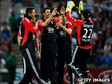 England celebrate a wicket