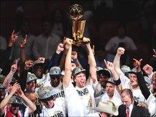 The Dallas Mavericks celebrate after winning the NBA Finals in June