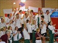 Guernsey swimmers celebrate another medal at the pool in the Isle of Wight