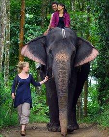 Laura Puukko with an elephant in Kerala