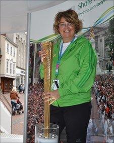 Jayne Rowley-Evans with the Olympic torch