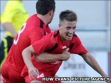 Jordan Follows celebrates his opener with Antonio Corbisiero