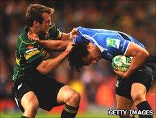 Stephen Myler (left) gets to grips with Isa Nacewa