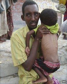 Somali man and child