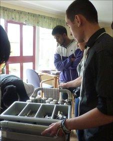 Teenagers helping serve lunch at Elgin Resource Centre