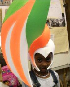 Girl wearing carnival hat