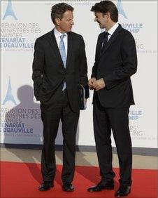 US treasury secretary Tim Geithner talks with French finance minister Francois Baroin