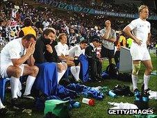 England's bench looks on as they lose to France in the Rugby World Cup quarter-final