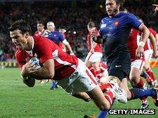 Mike Phillips dives over to score Wales' try