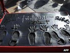 Twilight cast leave feet and handprints in cement in LA