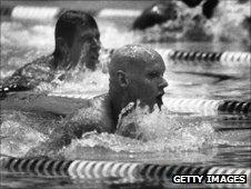 Duncan Goodhew (centre) on his way to breaststroke gold glory in Moscow