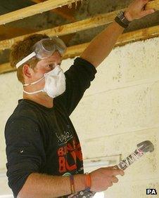 Prince Harry helps rebuild the Thuso Centre for disabled children in Lesotho, Africa, in 2008.