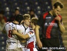 Ulster players celebrate following Andrew Trimble's try against Edinburgh