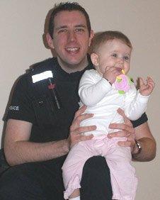 PC Tristan Barnett with Amelia