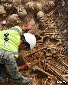 Archaeologist with the skulls