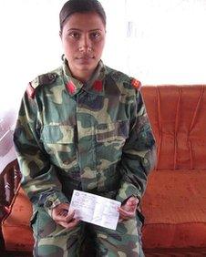 Former Maoist fighter Rohinni with her demobilisation cheque