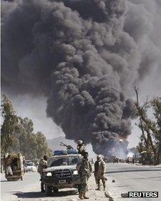 Smoke during a protest against Koran burnings in Jalalabad province