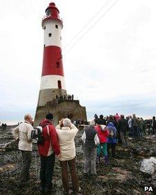 Walkers queue at Beachy Head lighthouse