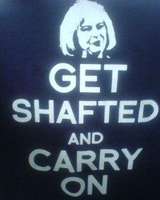 "Get shafted and carry on" T-shirt being worn by protesting police officers