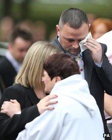 Rev Lynne Connolly greets Michelle and Kenny Heaton