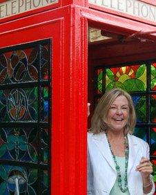 Hilary Beal in the telephone box