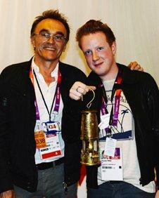 Danny Boyle and Alex Trimble backstage at the Olympic Stadium, with the Olympic flame