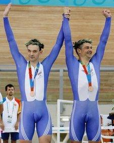 ATHENS, GREECE - SEPTEMBER 19: Ian Sharpe and Paul Hunter take the Bronze Medal after finishing third in the Mens Individual Pursuit Open(B1-3) Finals at the Olympic Velodrome within the Olympic Sports Complex in Athens, Greece. (Photo by Ker Robertson/Getty Images)