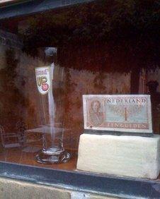 Beer glass and guilder note